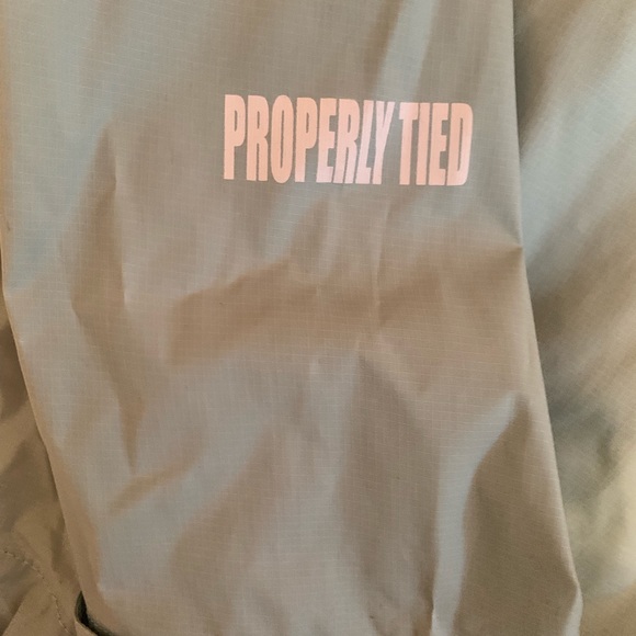 Properly Tied Raincoat - Picture 5 of 5